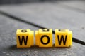 Wow concept, inscription on yellow cubes Royalty Free Stock Photo