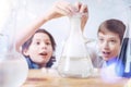 Close up of schoolboys during chemistry practical session Royalty Free Stock Photo