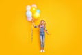 Wow it for me. full size photo amazed crazy funny kid hold many air baloons she get receive from her family on