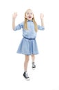 Wow! Studio portrait of excited little girl raised her palms up