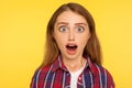 Wow, unbelievable! closeup caricature comic portrait of shocked or surprised funny young woman looking at camera with open mouth Royalty Free Stock Photo