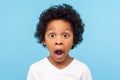 Wow, unbelievable! Portrait of funny amazed little boy looking at camera with shocked astonished expression Royalty Free Stock Photo