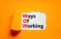 WOW ways of working symbol. Concept words WOW ways of working on white paper on a beautiful orange background. Business and WOW Royalty Free Stock Photo
