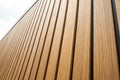WPC wood vertical pattern in light brown Royalty Free Stock Photo
