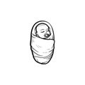 Wraped infant hand drawn outline doodle icon. Royalty Free Stock Photo