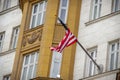 Wrapped around flagpole flag of the USA