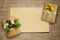 Wrapped boxes and paper card on canvas Royalty Free Stock Photo