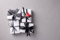 Wrapped boxes with presents wity red heart on grey  textured background. Royalty Free Stock Photo