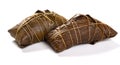 Wrapped Chinese ZongZi on white for Dragon Boat Festival ie DuanWu festival on white Royalty Free Stock Photo