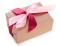 Wrapped gift box with two colors red and pink ribbon bow, isolated on a white background, close up, top view Royalty Free Stock Photo