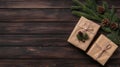 Wrapped gifts with pine cones and greenery on a rustic wooden surface Royalty Free Stock Photo