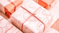 Wrapped gifts showing minimalist line drawings on wrapping paper