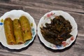 wrapped grape leaves and stuffed squash, courgette, marrow, mahshi, or zucchini filled with white rice, onion, parsley, dill