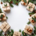 Wrapped holiday gifts arranged in a circular pattern surrounded by pine branches and cones Royalty Free Stock Photo