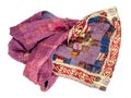 Wrapped patchwork scarf from purple silk fabrics Royalty Free Stock Photo
