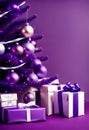 purple christmas gift parcels under a tree decorated with matching baubles Royalty Free Stock Photo