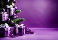 wrapped purple christmas gift parcels under a tree decorated with matching baubles Royalty Free Stock Photo