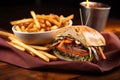 wrapped smoked beef brisket sandwich with fries Royalty Free Stock Photo