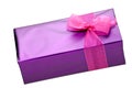 Wrapped vintage gift box with pink ribbon bow, isolated on white Royalty Free Stock Photo