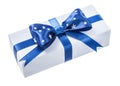 Wrapped white gift box with blue ribbon isolated on white