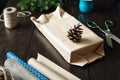 Wrapping Christmas gift boxes wooden table Rustic Christmas background. Wrapping presents background Royalty Free Stock Photo