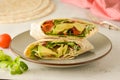 Wraps or torttila. Avocado, vegan wrap sandwiches. Healthy food