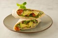 Wraps or torttila. Avocado, vegan wrap sandwiches. Healthy food