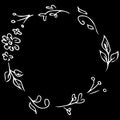 Wreath of abstract flowers and branches isolated on black background. Foral frame design elements for invitations, greeting cards Royalty Free Stock Photo