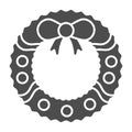 Wreath with bow line and solid icon. Round Xmas pine garland outline style pictogram on white background. Christmas Royalty Free Stock Photo