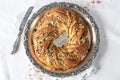 Wreath Bread on a vintage tray with pistachio filling Royalty Free Stock Photo