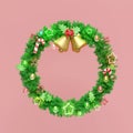 wreath with decorated branches of pine trees, Jingle bell, candy cane, red bow, holly berry leaves, clear glass lantern garlands, Royalty Free Stock Photo