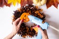 Wreath on the door, Halloween step by step instructions, diy. Thanksgiving door decor, lesson for children. Step 4 Royalty Free Stock Photo