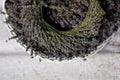 A wreath of lavender flowers in a white basket with selective focus on a blurred background. Copy space Royalty Free Stock Photo