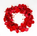 Wreath of petals of red roses and red hearts Royalty Free Stock Photo