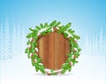 Wreath from snowy fir tree branch and cones on round wood border. Winter forest christmas horizontal background with snowflakes Royalty Free Stock Photo