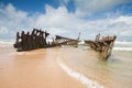 Wreck on australian beach during the day Royalty Free Stock Photo