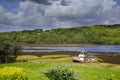 The wreck of a dry boat on the Irish Glen River in County Donegal