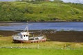 The wreck of a dry boat on the Irish Glen River in County Donegal