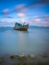 The wreck of a fishing boat was hit by the waves crashing onto the shore