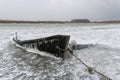 The wreck of a frozen fishing boat