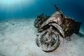 Wreck motorcycle in crystal clear blue water at Racha Yai island