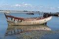 Wreck of an old fishing boat in the boat graveyard Royalty Free Stock Photo