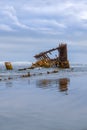 Wreck of the Peter Iredale along pacific coast in Oregon on a cloudy day Royalty Free Stock Photo
