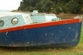 Wreck of small plywood sailboat