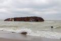 ODESSA, UKRAINE - 11.23.2019: The wreck of a small tanker `DELFI` off the coast of Odessa.