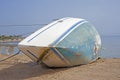 Wreckage of a sailing yacht on the shore