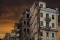 The wreckage and the skeleton of an old building destroyed to make room for modern development