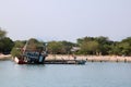 Wreckage wooden fishing boat was being stuck on the beach