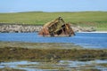 Wrecked block ship and concrete causeway