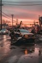 a wrecked car being towed away from an accident scene